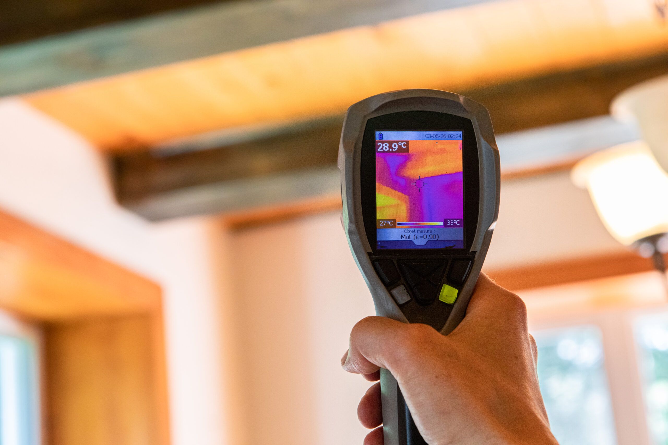 A home being inspected with a thermal imaging camera